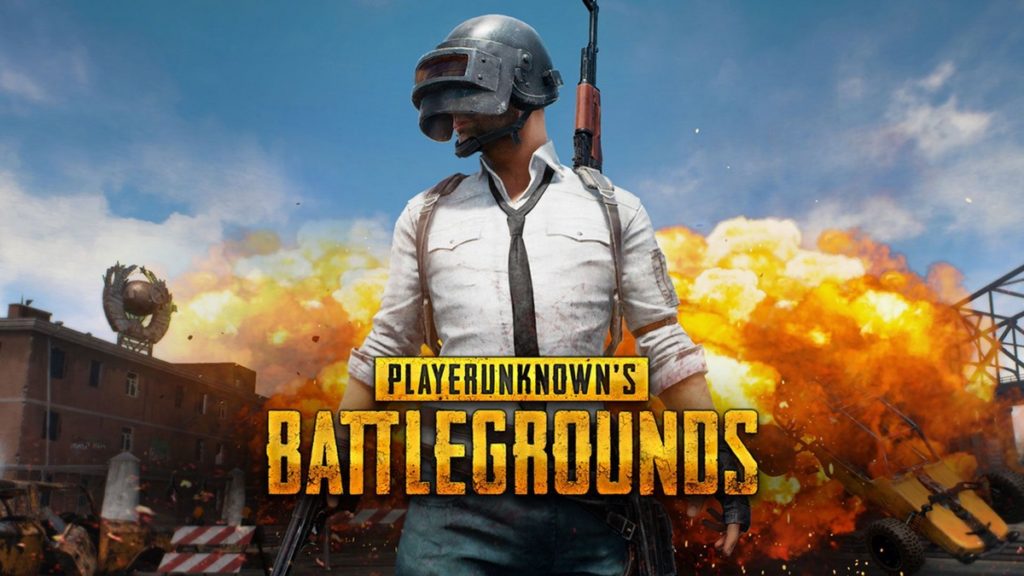 Experience characters like the ones pictured on this cover with Playerunknown's Battlegrounds. The Game That started Battle Royale Mode: A man wearing a typical PUBG helmet of the strongest class can be seen centrally. He holds a pistol in his right hand and has a Kalashnikov shouldered. Behind him, a violent explosion is taking place. The title of the game is shown in yellow in front of the character.