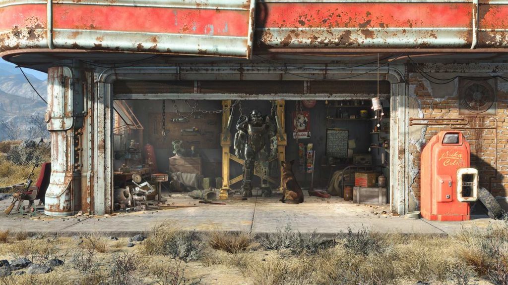 Enjoy the fourth part of the game in new graphical beauty with the new Fallout 4 DLC, as illustrated in this image: We are looking frontally at a rusted garage in total view during daylight. The building stands in a dry landscape, and a mountain range can be seen in the background on the left edge of the image. The garage consists of a brownstone facade, rusted metal, and a red tin roof that is also rusted. On the right side of the stone wall is a red beverage vending machine, which appears to be out of service. A workbench can be seen in the garage on the left. Numerous objects and scrap metal lie in the garage. In the center stands a character in black battle armor and a full black helmet, facing us. In front of him, slightly to the right, sits a sheepdog, glaring at him. The so-called next-gen update from Bethesda will possibly outshine one or the other mod or ENB from fans.