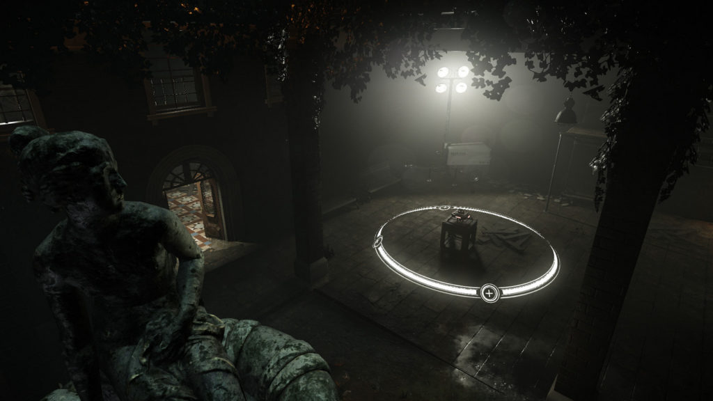 Try to escape from the madness together with your friends in Deceit, one of the best free horror games. In this screenshot, we can see a dark level of the game. A dark stone hall with a high ceiling is shown. On the right side, we can see a kind of square altar in the middle of the room, with two large angular pillars at its corners on the left and right. In the center of the altar is a small, angular, relic-like object that glows a bit orange and is surrounded by a white round outline serving the gameplay. The altar is illuminated by a white light coming through a window. Ivy can be seen above the altar.
