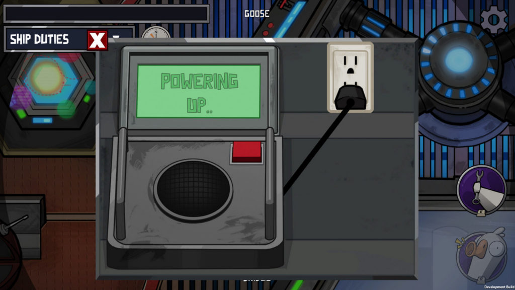 As a Goose, we are looking at a ship duty in first person perspective. In the center of the image is a power station in gray with a green display that says "Powering Up..." in capital letters. Below that is some kind of microphone or speaker, and slightly diagonally to the top right above that is a red rectangular button. To the right of this is a black power cable, which leads to a socket further up on the right. The plug is not yet plugged in and it will be the goose's job to plug it back into the socket. Behind the power device, we catch sight of various spaceship-like elements in blue and also brown.