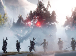According to the latest rumors, a Horizon MMO is being planned. A co-op-style multiplayer might appear soon. In this screenshot, we see several characters standing in a row in front of giant creatures, ready to fight. They are shown in a long shot at the bottom of the screen, facing us, and have an Indian-like appearance with axes, sticks, and headdresses with large feathers coming out of them. Behind them, a strong mist can be seen and behind it, three staggered giant creatures with red glowing eyes that resemble elephants are shown. On top of the elephants are defensive structures where archers are stationed. On the left, green trees rise out of the fog, and in the distance, we can see a huge steep mountain range in the blur.