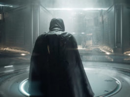 Here we see a screenshot from NCsoft's new LLL game, on which the protagonist can be seen from behind in a dark robe in third person view, as he just walks through a futuristic room, which is illuminated from above by a bright white light. In the middle of the round room, there is also a round platform, towards which the Main Character is walking. There are corridors to the right and left, and in the background of the image in front of the character, a robot-like structure can be guessed slightly. The MMORPG offers exciting gameplay and is a sci-fi shooter.