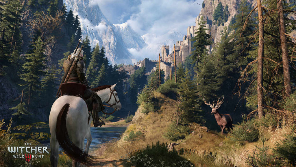 In the third person, we see the protagonist in total view on the left side of the image on a white horse. He has reached a bright clearing at the edge of a forest in daylight and is standing on the grassy ground. On the left and in the picture in front of him is a river leading to the center of the picture. The protagonist's gaze leads to a brown stag with antlers, which is just emerging from a conifer forest and is also looking at him. Behind the river and also on the left side, high mountains with more conifers are depicted. We recognize a stone bridge on a rock in the center of the picture behind the river. In the distance, we can see an even higher mountain range sticking out of the picture to the upper left, surrounded by clouds and fog. This natural scenario should also appear in The Witcher 4.