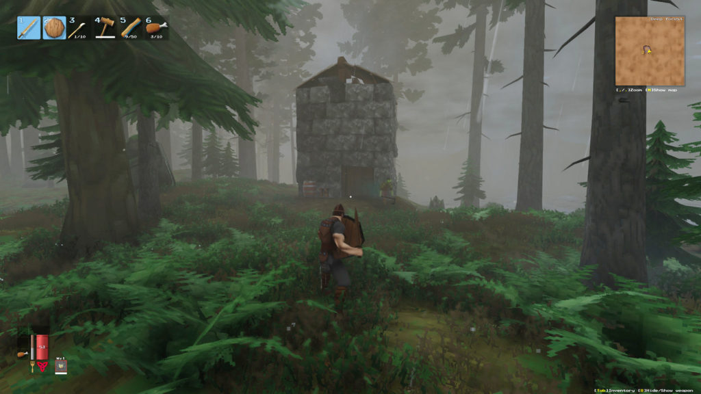 Go into battle as a Viking with a spear and shield, like here in this screenshot, where the player walks through a forest armed in the third-person. In the background, a small stone tower as the supposed dwelling of the player. As one of the best sandbox games, you can play the game on PC with friends via Steam.