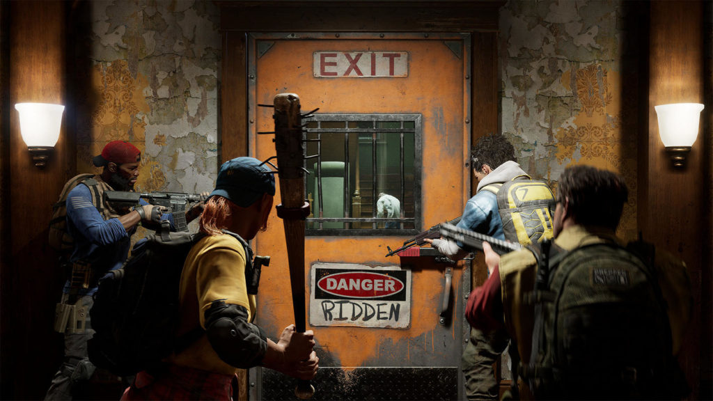 Back 4 Blood is one of the most action-packed zombie shooters and best PS5 co-op games in 2022. In this screenshot, we see four playable characters from behind in the semi-close-up. They are standing in a safe zone in front of a locked orange steel door with an exit sign mounted on it as well as a danger sign that reads "Danger, Ridden" in capital letters and red paint. Through the barred window, we can see a stairwell in the background with a white zombie standing in it. The players have different clothes and have backpacks on their backs. One female player on the left is armed with a baseball bat. The room is slightly lit by two sconces.