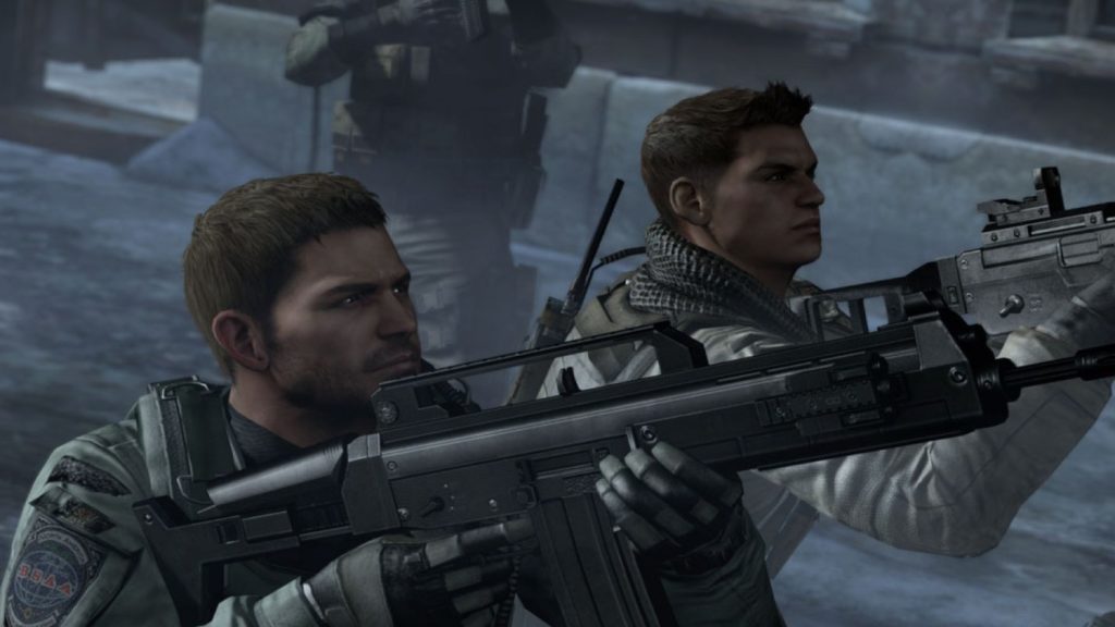 Two main characters from Resident Evil 6 are shown in this screenshot on the right, parallel in half-profile in the semi-close-up. They both have black hair and are wearing a gray body armor and dark gray combat gloves. Their gazes go out of the picture on the right and they both hold Assault Rifles in their hands, which are partially cropped from the picture. In the background of the image on the upper half on the left side, another soldier with similar combat gear can be seen in the crop. The soldiers have taken up position in the middle of an asphalt road at night. Take on the role of one of the main characters and fight side by side with your friends in one of the best PS5 co-op games.