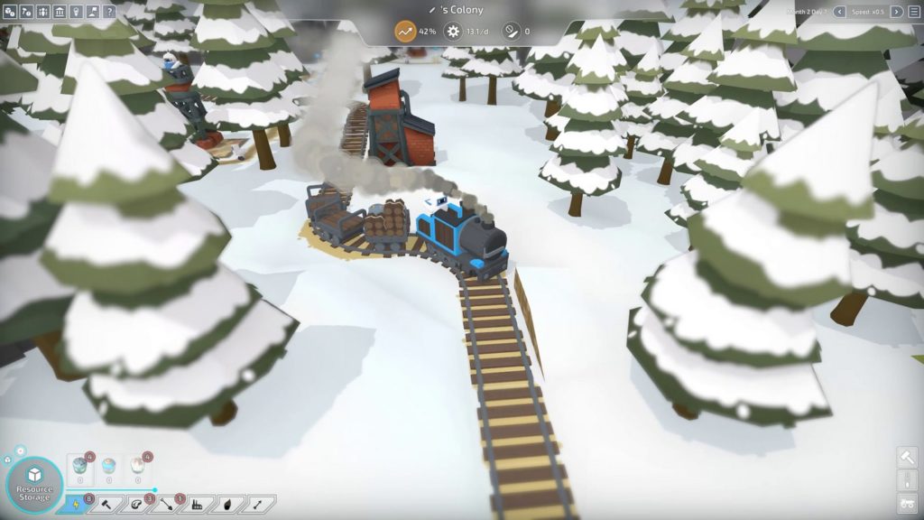 In this screenshot from The Colonists, we see a snow-covered forest by day in an isometric zoomed-in perspective. To the left and right of the image are snow-covered fir trees in stylized polygon graphics. A railroad track is shown in the center of the image, running vertically from top to bottom through the image. On the rail, a small blue-gray locomotive with gray steam is driving through the picture, which we see in the center. At the back of the locomotive sits a cute white Wall-E-like robot. Behind the locomotive is a small red train station to the right of the tracks. With this title, you will surely play one of the cutest city building games.
