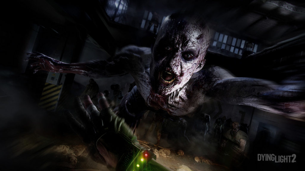 In this screenshot from Dying Light 2: Stay Human, we look from the first-person perspective directly into the pale face of an infected person, which is covered by numerous red veins. He jumps at us with his mouth wide open and grim eyes, and we raise our left hand to fight him off. The scene takes place at night and the image is heavily blurry towards the edges due to motion blur. Experience one of the most rewarding co-op horror games.