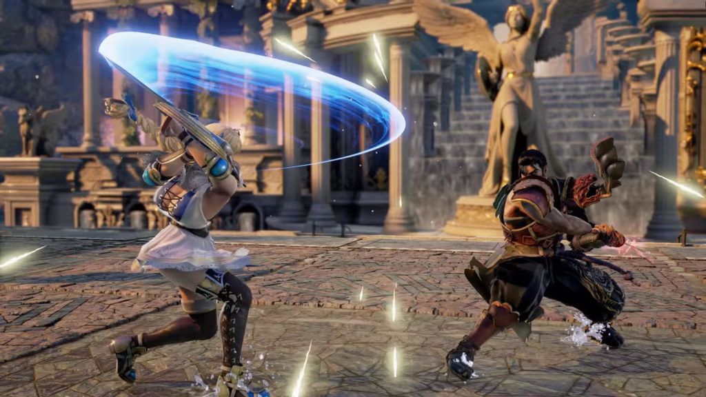 This screenshot from SoulCalibur VI shows a female character on the left and a male character on the right in profile in a long shot as they fight each other in daylight. They are on a stone arena in front of a yellow temple, which consists of numerous columns, in front of which stands a female statue with wings, which is shown in the blur on the back right of the image. The female warrior on the left of the picture is the same female warrior with a white dress and a blond braid. She is performing a horizontal strike with her round shield so that a blue tail can be seen. The character on the right again has a very samurai-like look with red battle gear and wears a red and black headdress. Broad-legged, he holds a red glowing katana in his hand with both legs and lunges straight for the next blow.