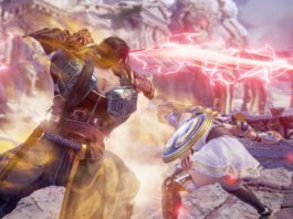 A screenshot of the game Soulcalibur VI is shown. On it, we see two characters in battle gear in an oblique perspective view in the half-total during the day. On the left side of the image, with his back turned towards us, stands a very muscular samurai warrior with a black pot and armor. He is executing a sword attack, which causes a red lightning bolt to run horizontally through the image. slightly in the background directly in front of him and slightly diagonally to the right is a female warrior. She has a long blonde braid, and a white dress, and is equipped with a sword and a round blue and gold shield. She is currently parrying the attack by ducking. The two are in a stone battle arena in the middle of a mountaintop, and in the background, you can see more rocks and temple-like pillars in the blur. With this title, you'll play one of the best fighting games for PC.