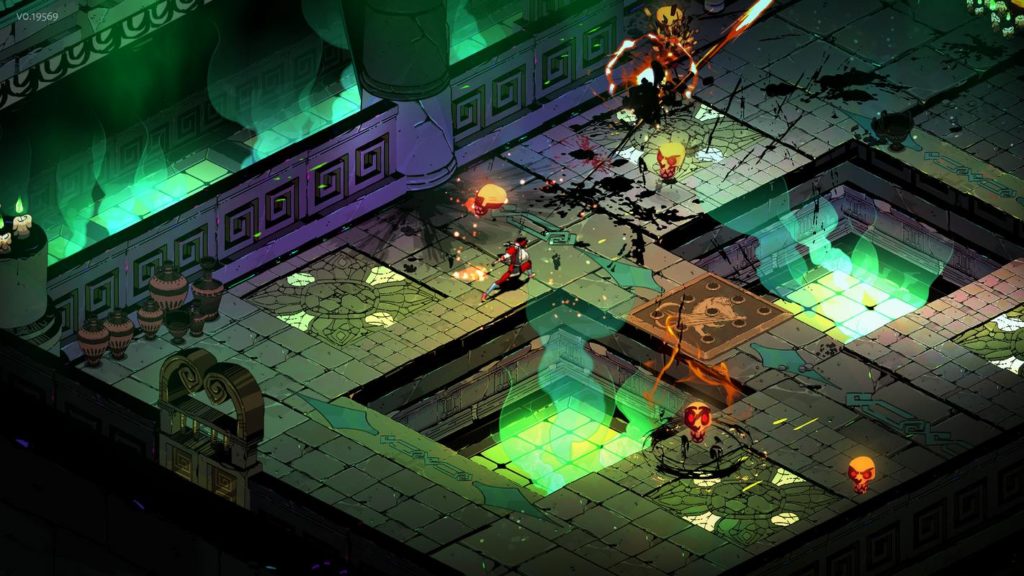 In this screenshot of Hades, we once again see the protagonist in his red clothing in the center of the picture. He is once again in a large gloomy hall with a high ceiling. At the bottom and on the right of the image, two square basins can be seen, from which green steam rises. At the top of the picture, there is a stone wall repeating the same angular dark spiral patterns and behind it, there are more basins from which green steam is coming out. Our hero has just shot a red flame in through an enemy, causing it to turn to a black slime and explode. four glowing orange skulls with glowing red eyes hover around the main character. This Roguelike is one of the best Switch games.
