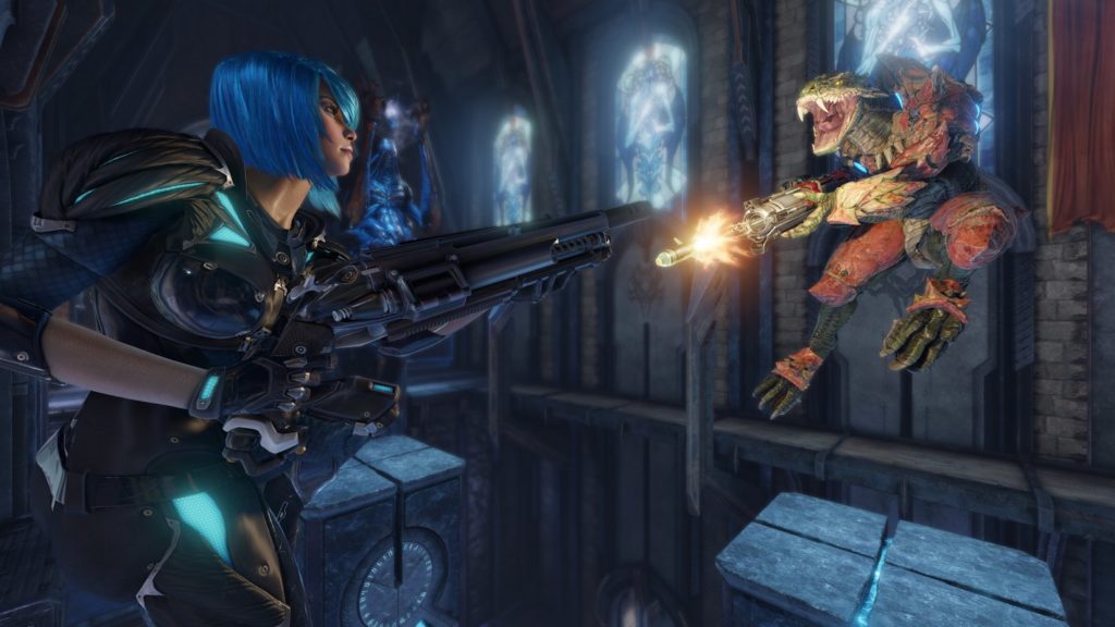 This screenshot from Quake Champions shows a duel between two players in a cathedral-like environment. On the left side, we catch sight of a female character in a semi-close-up in profile view. She has short blue hair and wears black battle armor with turquoise lights. In her hand she holds a futuristic shotgun, aiming it at the opponent we see a bit further away in the top right of the image. This player is a green lizard with red armor. With his mouth wide open, this player fires a shot with a silver Assault Rifle and is in the middle of a jump moment. Below the players, we can see a few column platforms, between which it goes into the abyss. In the background, we see a large stone facade with several large church-like windows with colored glass.