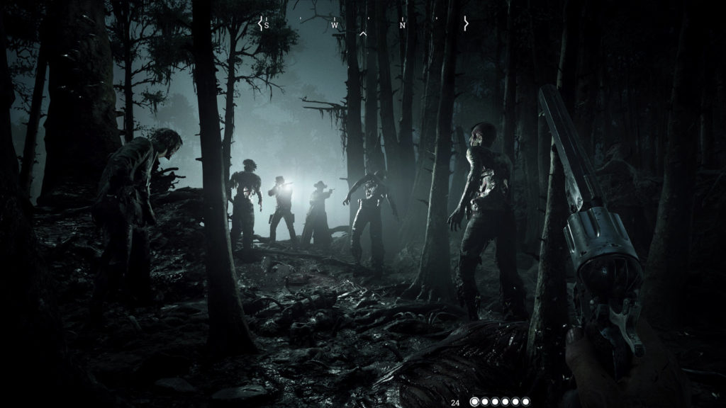 In this screenshot from Hunt: Showdown, the first-person player is in a dark, dense forest at night. The moon shines towards us from the background and illuminates the silhouettes of several zombies walking in the background. These are on their way to two cowboy characters shown in the center of the image, seen in silhouette at the edge of the forest. The person on the left is aiming a rifle at the zombie, while the person on the right has a revolver. We as players hold a revolver in our right hand.