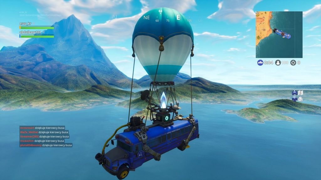 The correct landing on the map is crucial, as this screenshot should illustrate: In the center of the screenshot, a blue bus can be seen in a long shot, hovering with the help of a blue and white hot air balloon over the turquoise sea, which we can see below. The water takes up the entire lower half of the image and extends far into the background. There we see a green island landscape with a huge pointed mountain rising into the sky at the top left of the image. Overall, this map, which plays during the day, looks very bluish and friendly in this image. With the right Fortnite tips and best settings, you'll succeed in landing.
