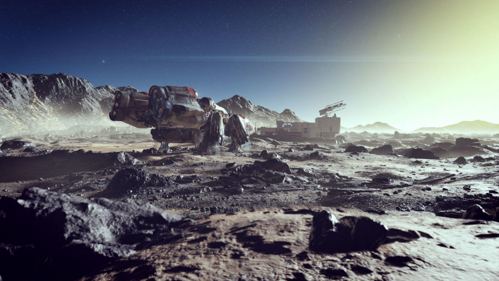In this screenshot, we are again on a planet. However, this time we are standing outside in a dusty, stony landscape and looking into the distance. In the center of the image, we see a huge spaceship with two large turbines at the rear, facing us. The spaceship is anchored to the ground with four legs. It has a metallic, partly reddish coloring. Further in the background, a bit to the right, we can see a space station shrouded in dust, which consists of several rectangular buildings and behind which a crane towers. In the background, a stone mountain range extends from the left to the right side of the image. Starfield is scheduled for release in the second half of the year and a release date is getting closer.