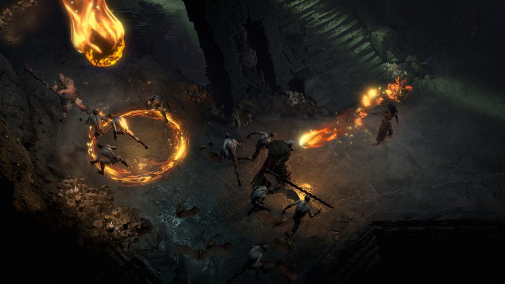 This time, there are two different playable characters on the left and right that perform fire attacks on monsters in a dark dungeon.
