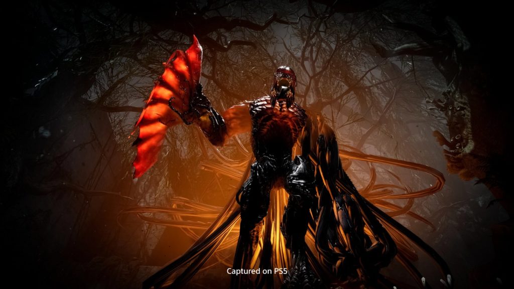 This black and orange glowing demonic creature from Returnal shown here can be destroyed most effectively in coop mode.