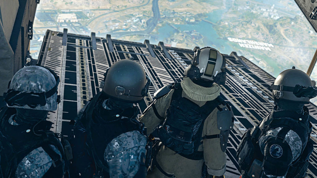A squad of four soldiers looks down from the plane at a vast landscape. The Warzone Season 2 patch notes bring many new features.