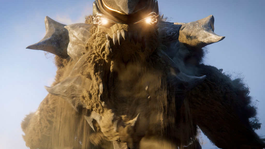 The gameplay of Atlas Fallen includes huge sandy creatures, one of which we see in close-up with its mouth open.