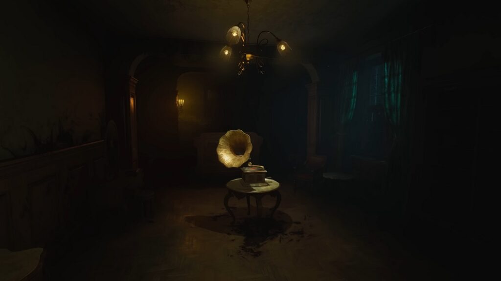 Here we see an old gramophone in the middle of a dark room in Layers of Fear. The gameplay has many jumpscares.